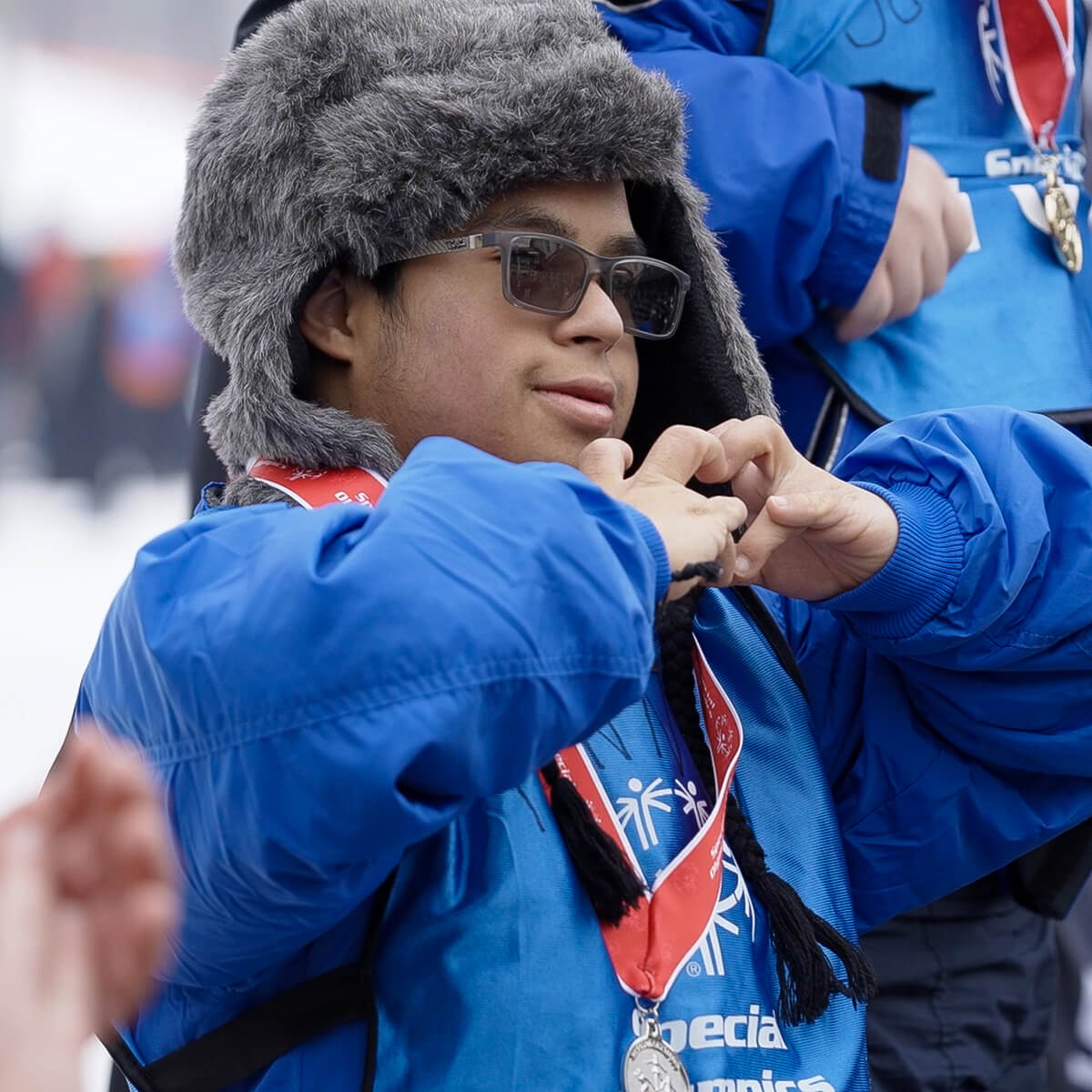Happy Awarded Special Olympics Member