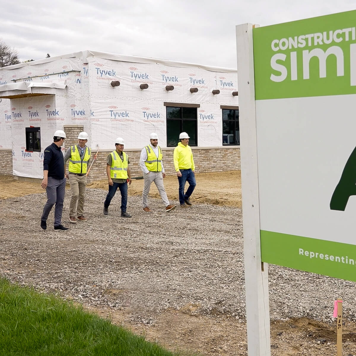 Construction Simplified Team Working Outside